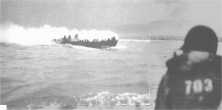 (details) a touched LCVP approaches the beach (Le Ruquet) (details) A LCVP has just emptyed, we see a tank on the beach