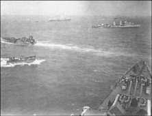 (details) "Ancon" and "Augusta" at anchor off Vierville (details) seen from the USS "Augusta", a US destroyer, a LCVP, a LCT, the "Ancon" in the distance (details) ship Tel