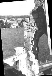 The castle seen from the ruined bell tower The field to the north of the castle transformed into road and land (details) The east wall and the road drawn by the US Engineers in the c