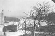 The castle seen from the ruined bell tower The field to the north of the castle transformed into road and land (details) The east wall and the road drawn by the US Engineers in the c