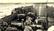 LCT Mark 5 A LCT charged with Jeeps approaches