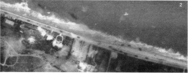 Auf diesem Foto von Dog Green Beach sind insgesamt 14 Panzer, aber auch 2 LCA in den Walzen gestrandet, Überreste der Landung der A- und B/116-Firmen. Es ist