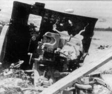 (détails) Un des canons de 75 Skoda, détruit le 6 juin, au WN62, dans la casemate haute?