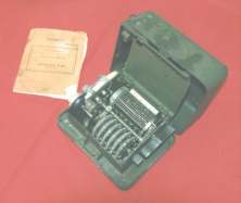 (details) A US M-209 encrypting machine, that of the 1st Battalion of the 116th, found in 1945 at the foot of the cliff of Vierville (details)